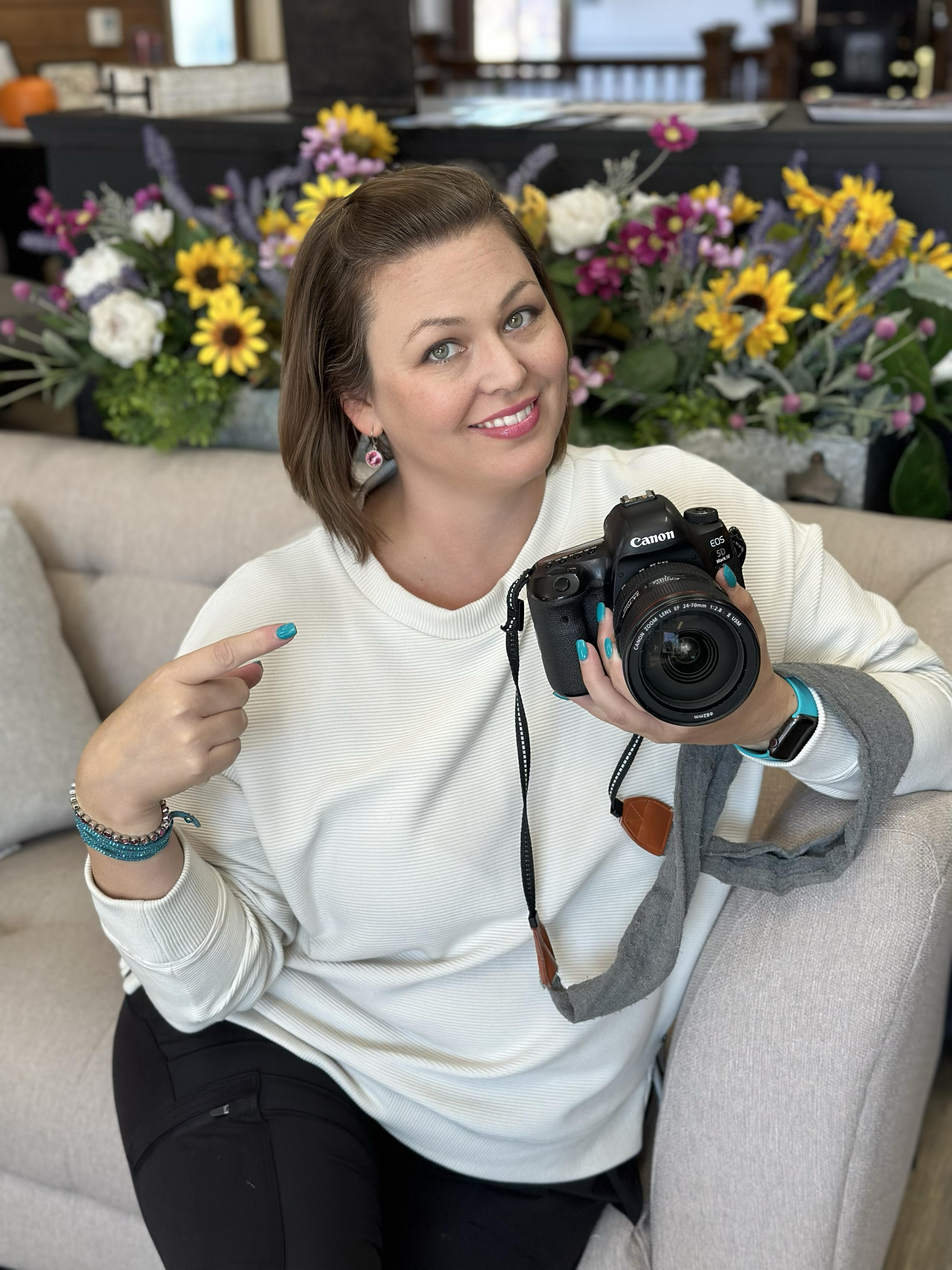 Samantha and her camera at the Brighton Chamber of Commerce Headshot event.